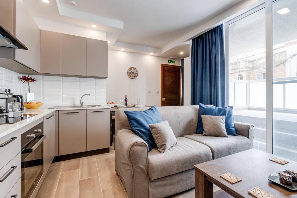 Designer 1 bed Maisonette Swieqi by Homely